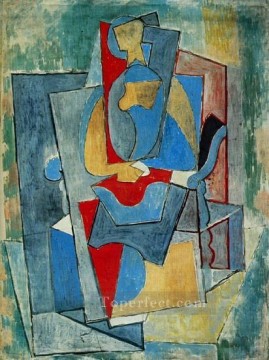 Femme assise dans un fauteuil rouge 1932 Cubism Oil Paintings